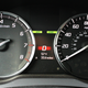 Red behind the drive mode or gear means Sport mode is engaged.